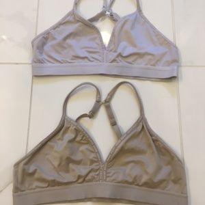 Beige and white Justice bras